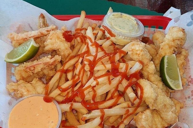 Bimini Island Food Taste Experience Tour - A beachside drink at Stuart’s Conch Stand