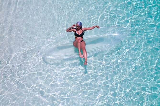Clear Kayak Drone and Beach Private Photography in The Bahamas - Entering the water and getting settled