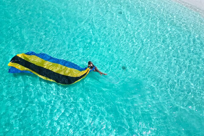 Nassau Clear Kayak Drone Photoshoot- Floating Dress - Why the Saunders Beach setting matters