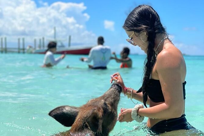 Nassau Swimming Pigs: Snorkeling, Lunch & Private Beach Club - Beach time, water toys, and the problem of the clock