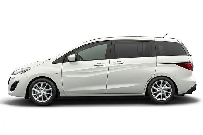 Private Roundtrip Sedan Airport Transfer to Paradise Island - Leaving Lynden Pindling International Airport with a name sign