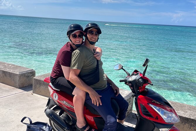 Scooter Rental Nassau - Riding a 150cc scooter with one passenger